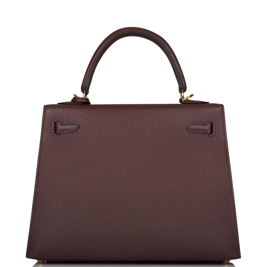 A view of the signature gold-tone turn-lock on the front flap of the bag