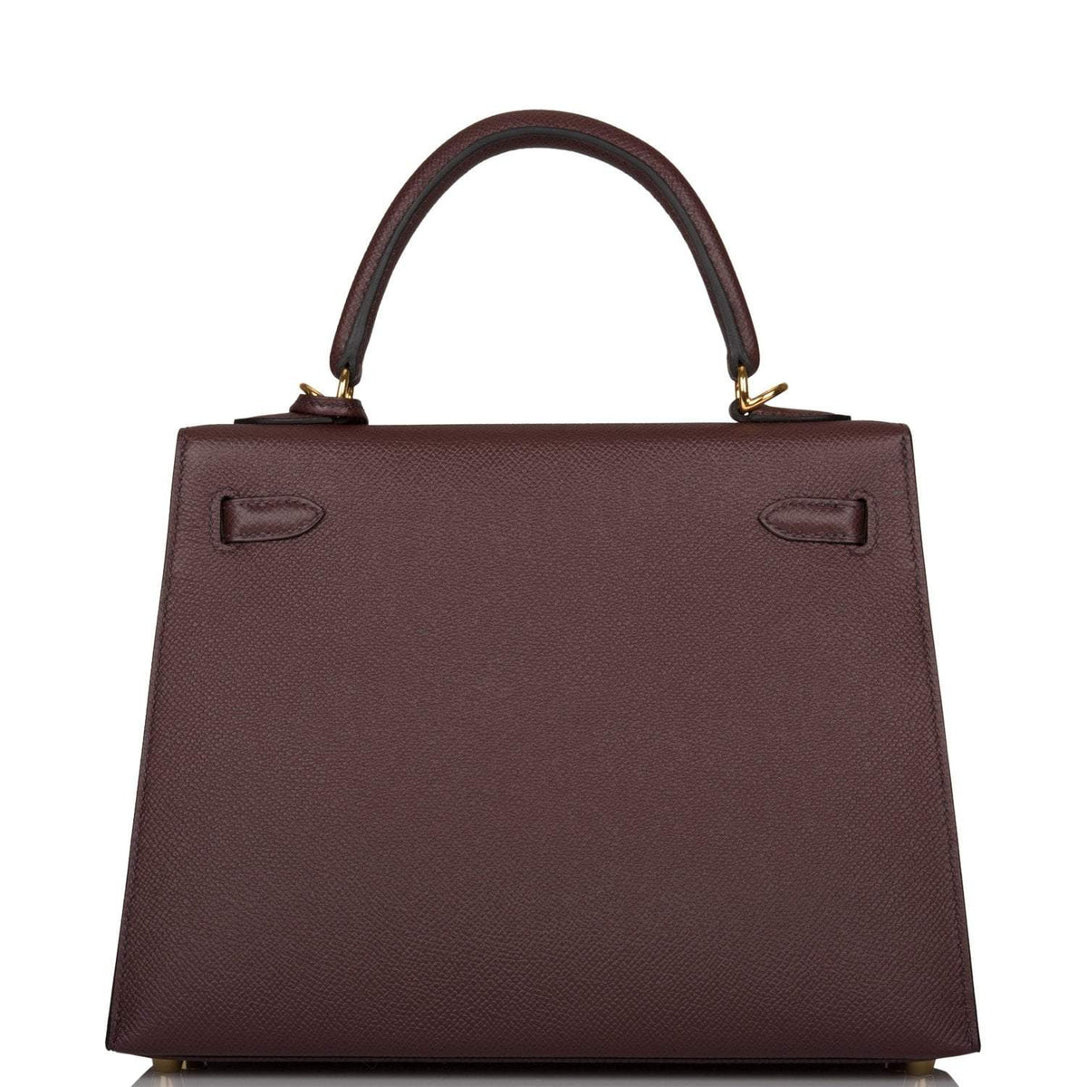 A view of the signature gold-tone turn-lock on the front flap of the bag