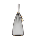 Top handle detail of Hermes Kelly Sellier 25 in Bleu Glacier