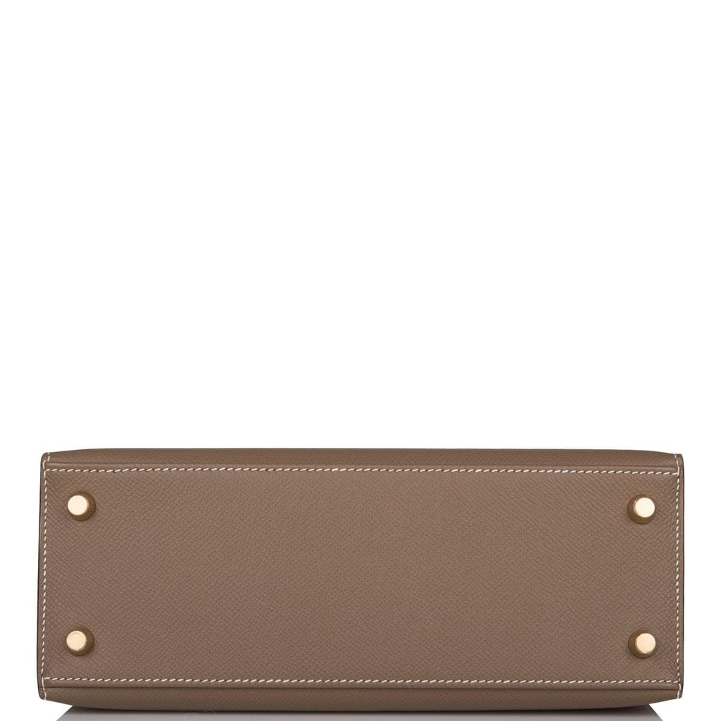 An image of the interior, showing the Chevre leather lining and pockets