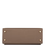 An image of the interior, showing the Chevre leather lining and pockets