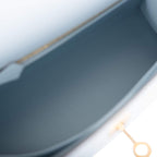 An image of the interior zip pocket with the Hermes-engraved pull