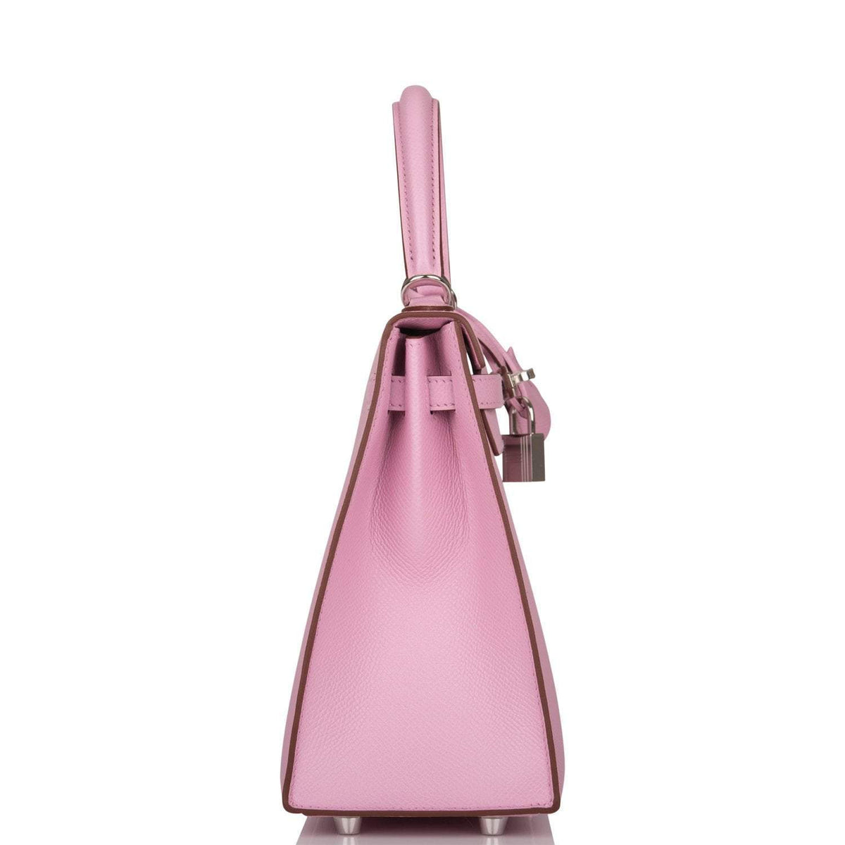 The Hermes Kelly Sellier 25 displayed on a surface, highlighting its structured form