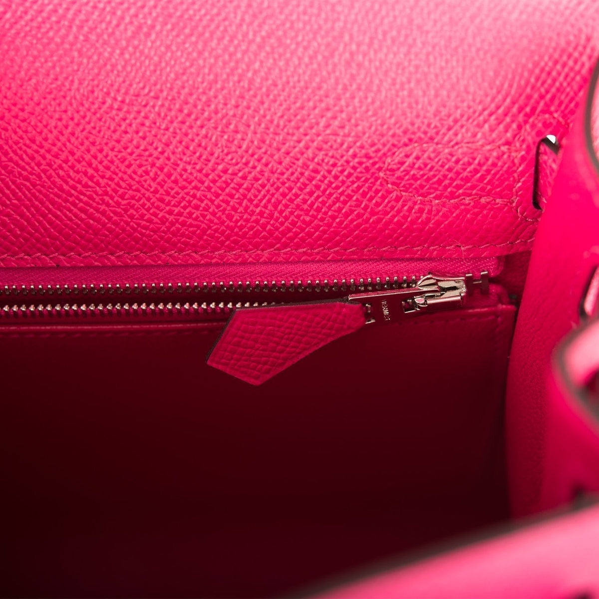 A detail shot showing the protective plastic film on the palladium hardware