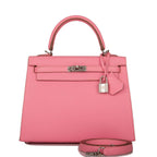 Close-up of the palladium-tone hardware and toggle closure on the Hermes Kelly 25