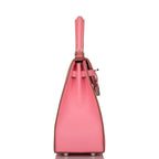 The Hermes Kelly Sellier 25 displayed on a surface, highlighting its structured form.