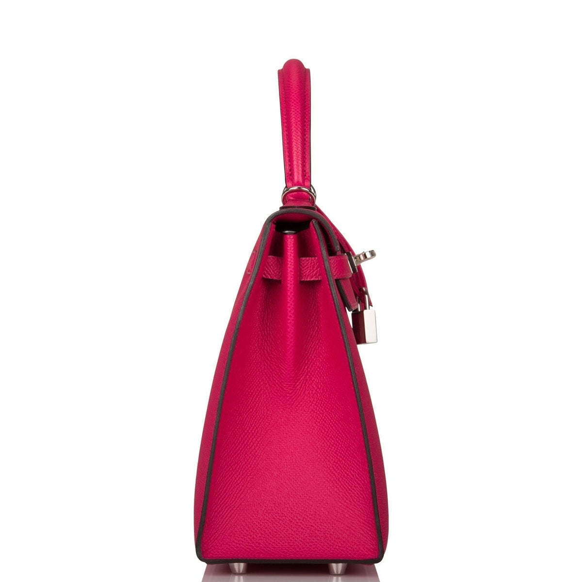 The Hermes Kelly Sellier 25 displayed on a surface, highlighting its structured form