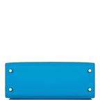 A view of the rolled top handle and the shoulder strap connection points