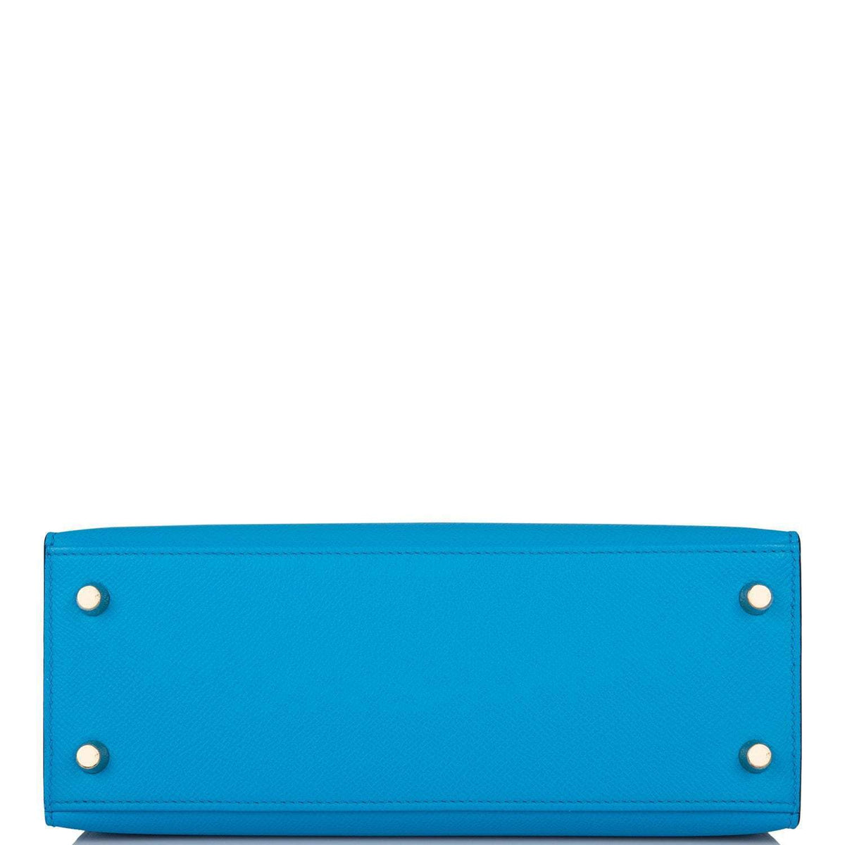 A view of the rolled top handle and the shoulder strap connection points