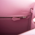 A shot of the bag alongside the included carebook