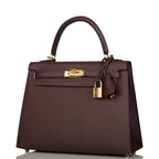 The Hermes Kelly Sellier 25 with its removable shoulder strap attached