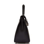 Side profile of the Hermes Kelly Sellier 28, highlighting its structured shape and materials