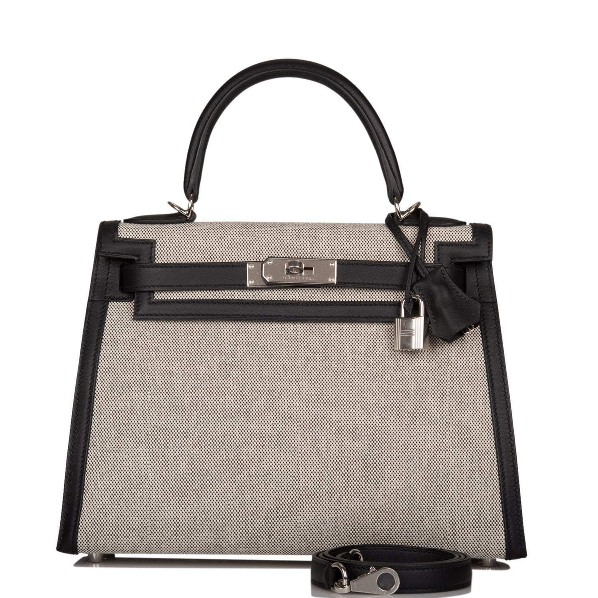 Front view of the Hermes Kelly Sellier 28 in black Toile and Swift leather