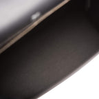 The Hermes Kelly Sellier 28 displayed on a surface, highlighting its structured form