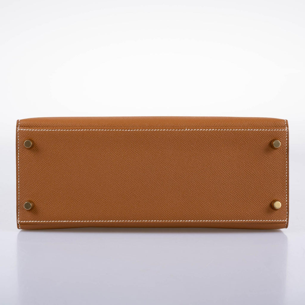 Hermes Kelly 28 Sellier Gold Epsom with Gold Hardware, A view of the base of the bag, showing the protective m