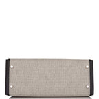 The Hermes Kelly Sellier 28 with its removable shoulder strap attached