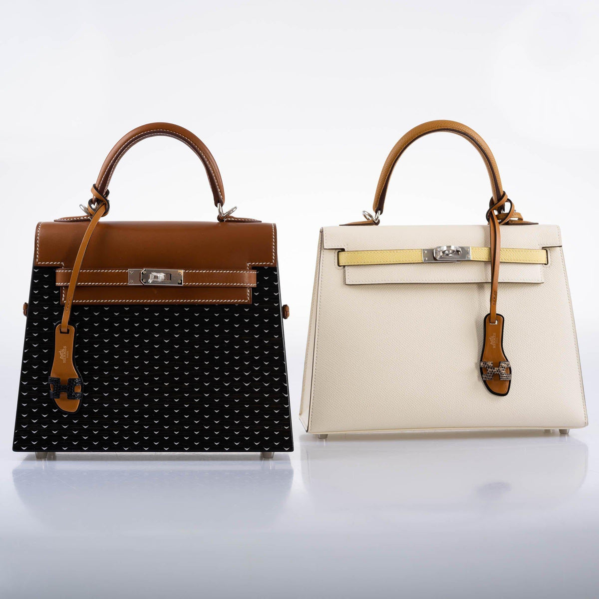 The top handle of the bag, showing the Barenia leather and design