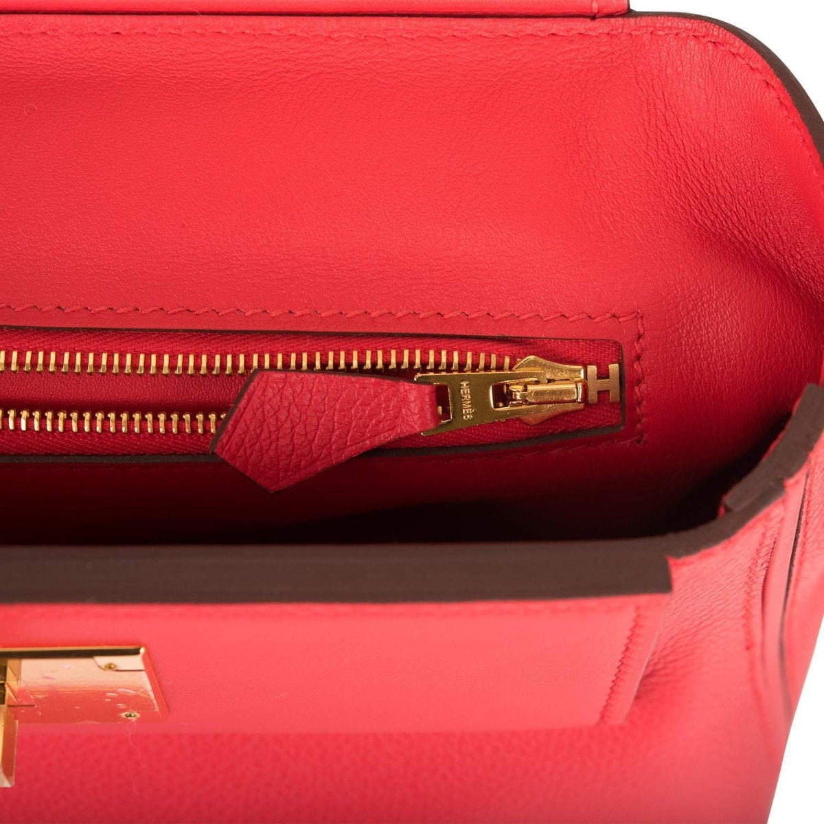 Detail of top handle on Hermes Mini 24/24 Rouge de Coeur
