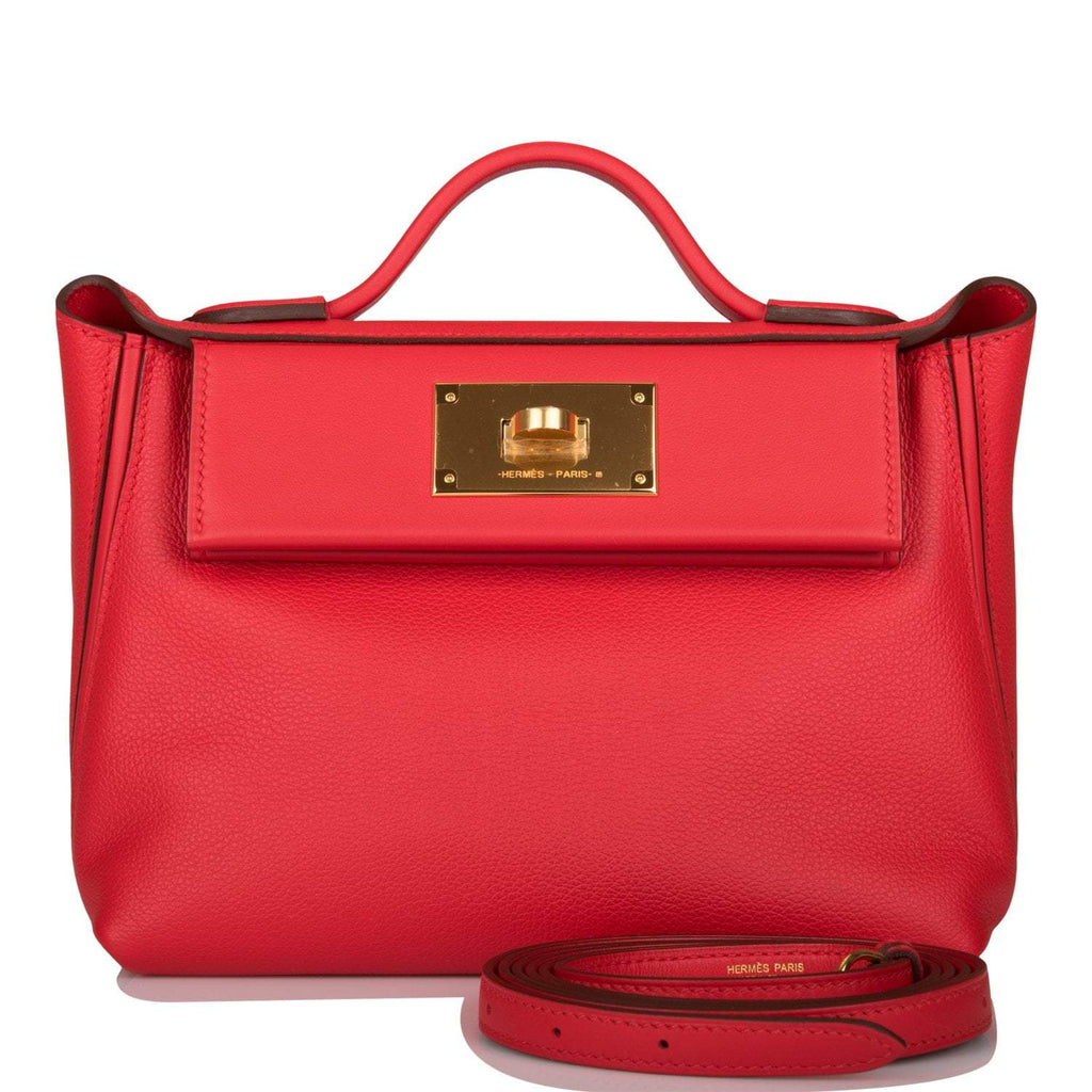 Side profile of Hermes Mini 24/24 with red leather and gold hardware