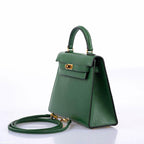Hermes Mini Kelly 15 Vert Clair Courchevel with Gold Hardware, A view of the signature gold-tone turn-lock on