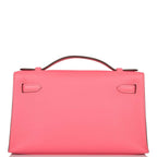 Hermes Rose Azalee Swift Mini Kelly Pochette Gold Hardware, the smooth texture of the Swift leather in Rose Az