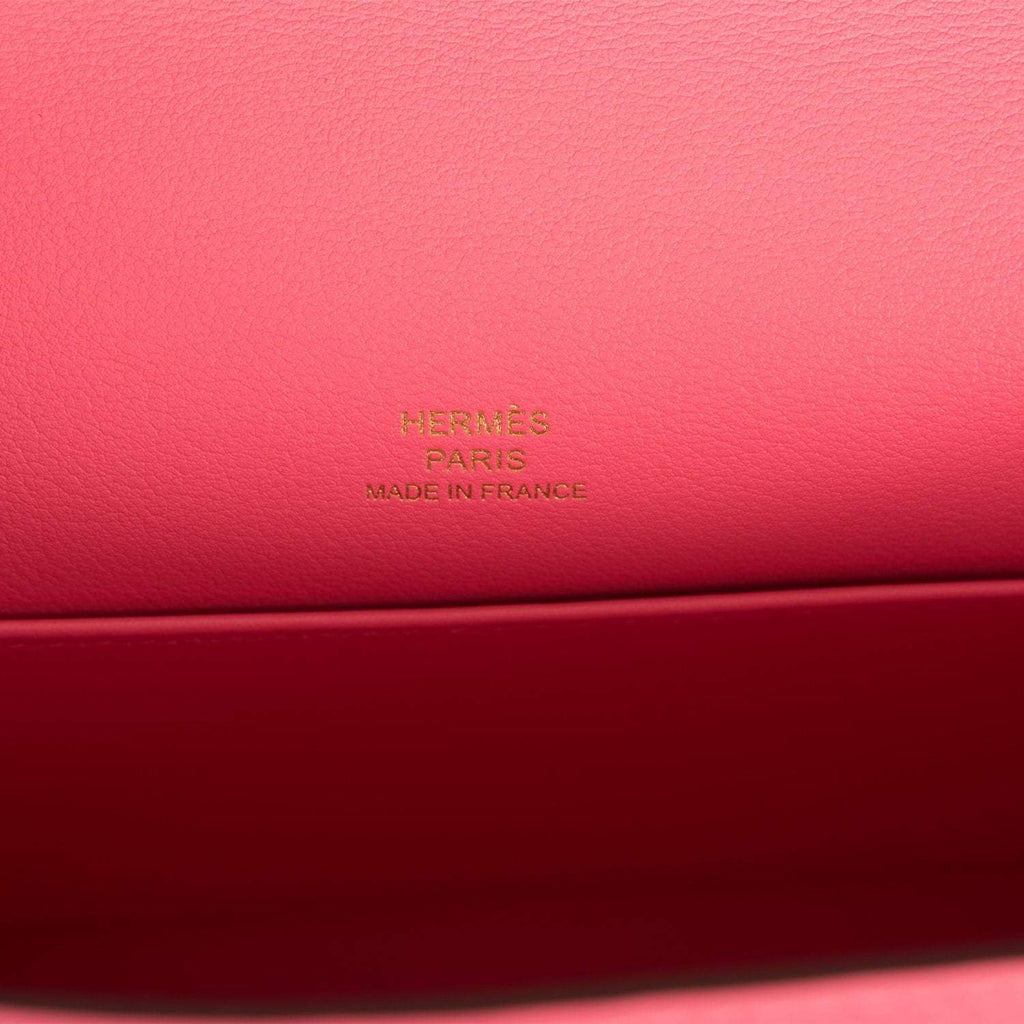 Hermes Rose Azalee Swift Mini Kelly Pochette Gold Hardware, the side gussets of the bag