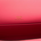 Hermes Rose Azalee Swift Mini Kelly Pochette Gold Hardware, the side gussets of the bag