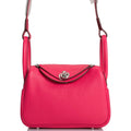 Hermes Mini Lindy handbag in Rose Extreme Clemence leather with palladium hardware.