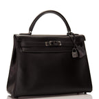 Side profile of the Kelly Retourne 32cm with black hardware