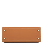 The Hermes Special Order Kelly 25 with its removable shoulder strap attached