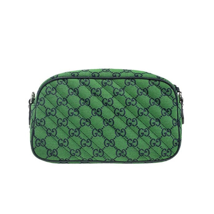 Gucci GG Canvas Marmont Small Shoulder Bag - Green in Green - detail view 9 showing the bag's shape, material finish and visible design details.
