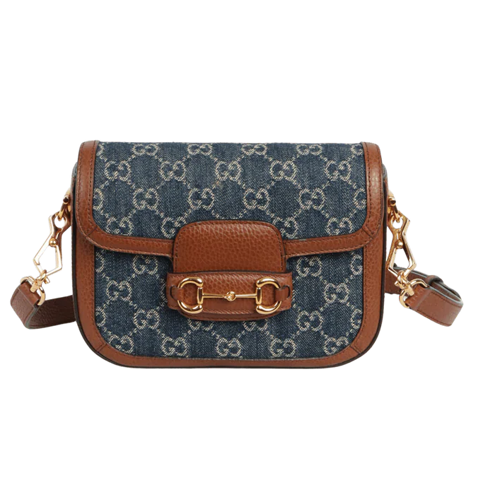 Gucci Blue GG Denim Horsebit 1955 Mini Crossbody Bag - Blue in Blue - side view showing the bag's shape, finish and visible design details.