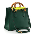 Gucci Diana Small Tote Bag - Green in Green - side view showing the bag's shape, finish and visible design details.