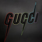 Gucci Blade Embroidered Leather Clutch Pouch - Black in Black - detail view 5 showing the bag's shape, finish and visible design details.