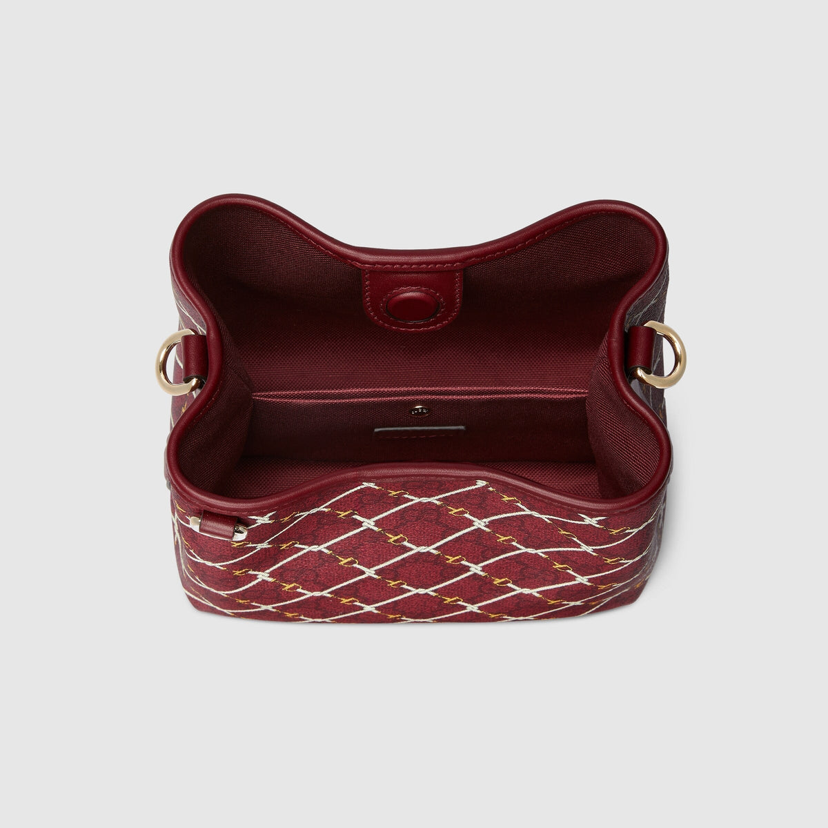 Gucci Emblem Small Bucket Bag - Red in Red - detail view 4 showing the bag's shape, material finish and visible design details.