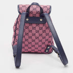 Gucci GG Canvas Backpack - Pink in Pink - detail view 5 showing the bag's shape, material finish and visible design details.