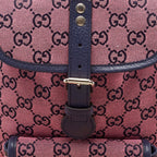Gucci GG Canvas Backpack - Pink in Pink - rear view showing the bag's shape, material finish and visible design details.
