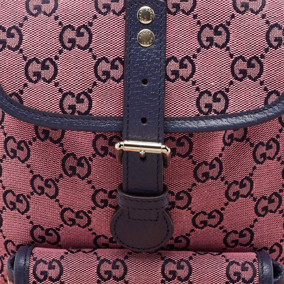 Gucci GG Canvas Backpack - Pink in Pink - rear view showing the bag's shape, material finish and visible design details.