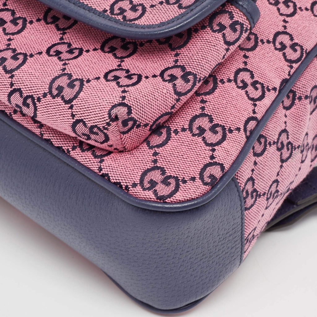 Gucci GG Canvas Backpack - Pink in Pink - detail view 7 showing the bag's shape, material finish and visible design details.