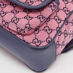 Gucci GG Canvas Backpack - Pink in Pink - detail view 7 showing the bag's shape, material finish and visible design details.