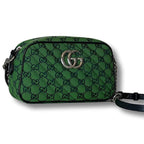 Gucci GG Canvas Marmont Small Shoulder Bag - Green in Green - rear view showing the bag's shape, material finish and visible design details.