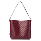Gucci GG Calfskin Emblem Medium Shoulder Bag - Pink in Pink - detail view 11 showing the bag's shape, material finish and visible design details.