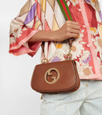 Gucci Blondie Mini Leather Shoulder Bag - Brown in Brown - detail view 16 showing the bag's shape, finish and visible design details.