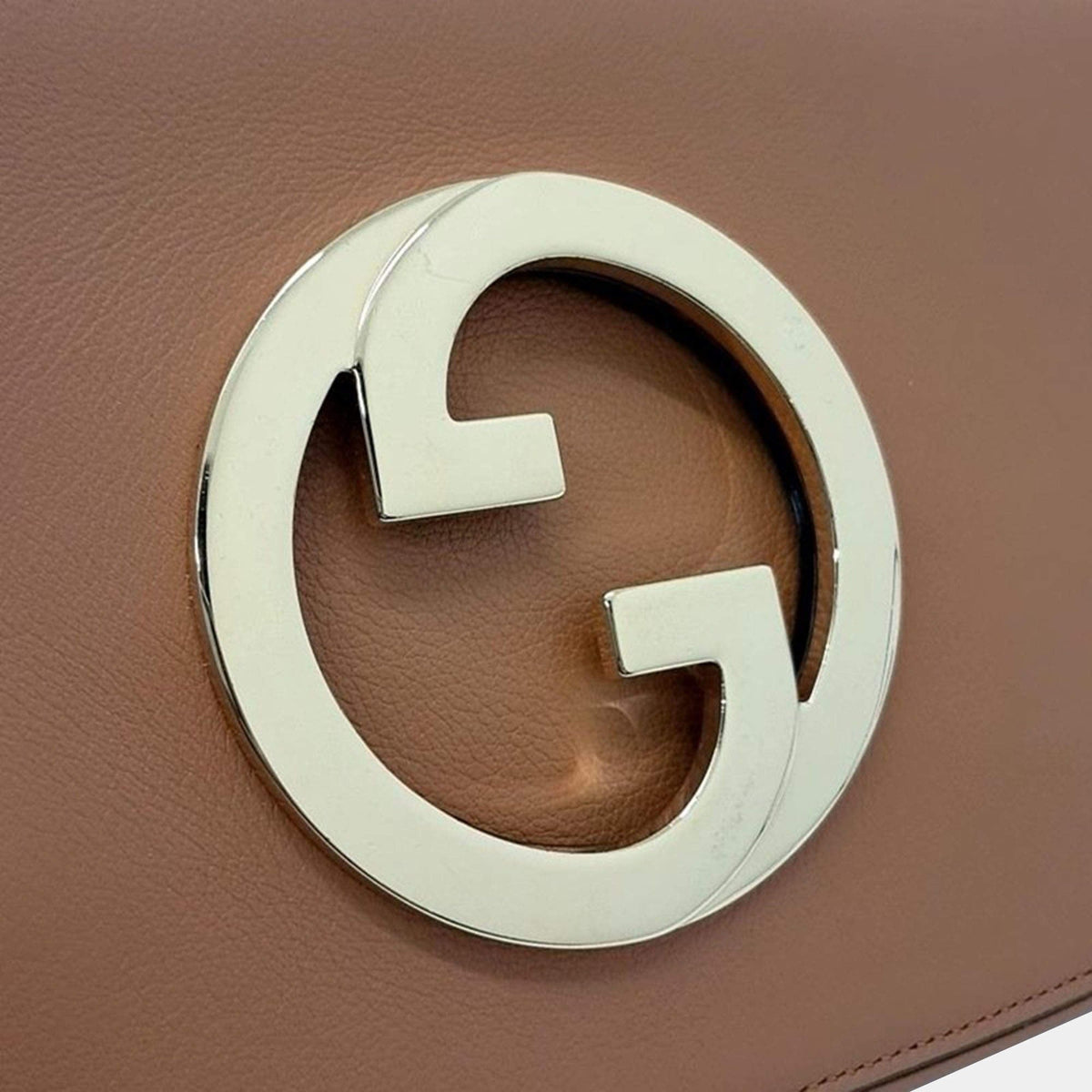 Gucci Blondie Shoulder Bag - Brown in Brown - rear view showing the bag's shape, finish and visible design details.