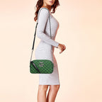 Gucci GG Canvas Marmont Small Shoulder Bag - Green in Green - detail view 11 showing the bag's shape, material finish and visible design details.