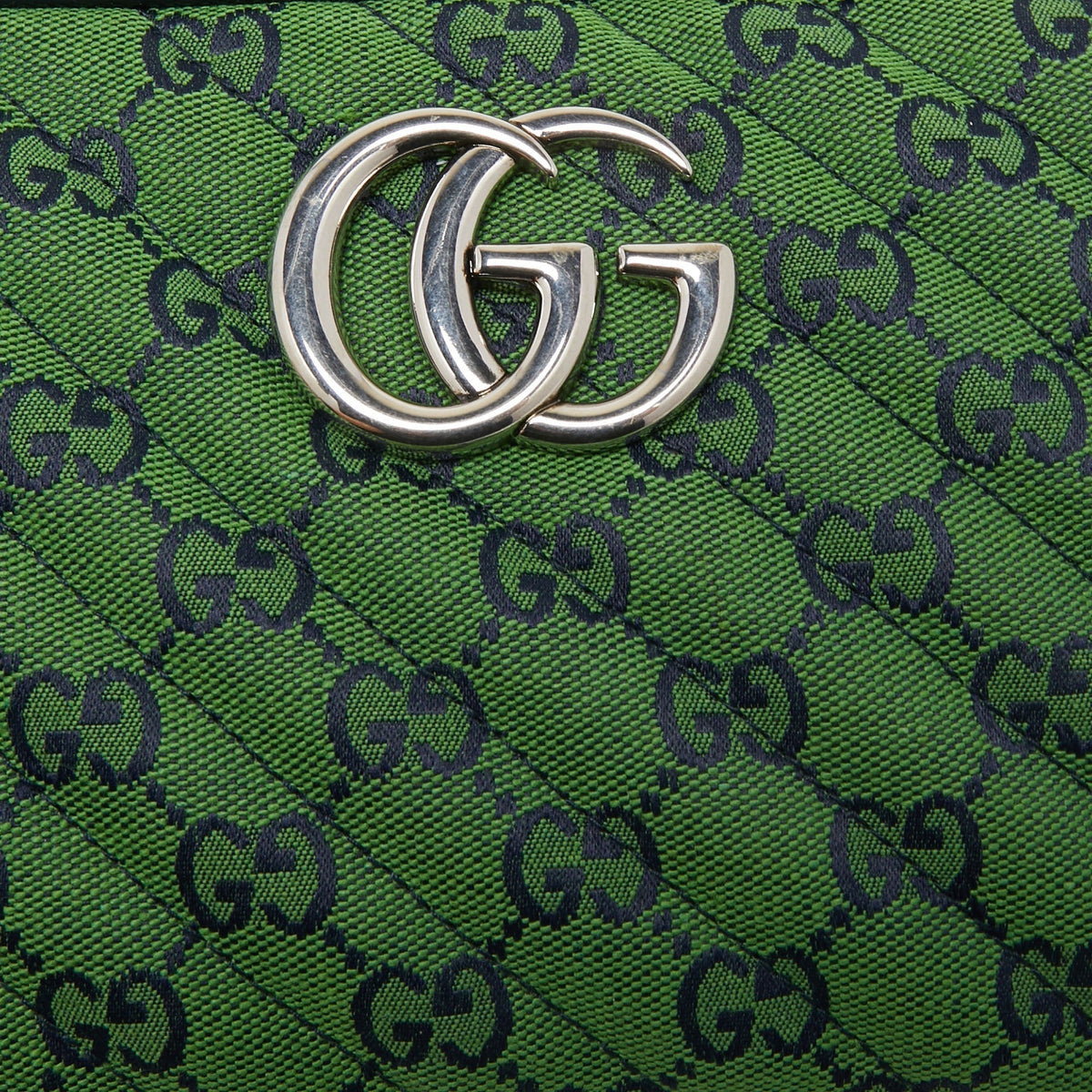 Gucci GG Canvas Marmont Small Shoulder Bag - Green in Green - detail view 5 showing the bag's shape, material finish and visible design details.