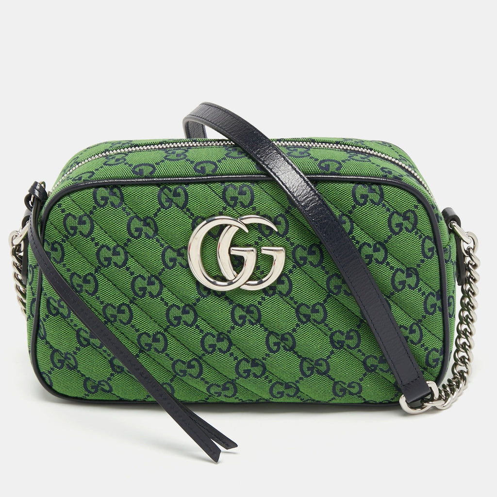 Gucci GG Canvas Marmont Small Shoulder Bag - Green in Green - side view showing the bag's shape, material finish and visible design details.