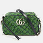 Gucci GG Canvas Marmont Small Shoulder Bag - Green in Green - side view showing the bag's shape, material finish and visible design details.