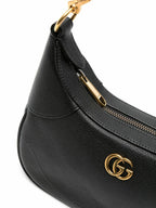 Gucci Aphrodite Small Leather Shoulder Bag - Black in Black - detail view 7 showing the bag's shape, finish and visible design details.