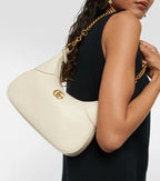 Gucci Aphrodite Small Leather Shoulder Bag - White in White - detail view 6 showing the bag's shape, finish and visible design details.